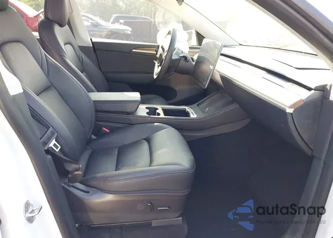 2023 Tesla Model Y from USA, damaged, VIN 7SAYGDEE1PF647564